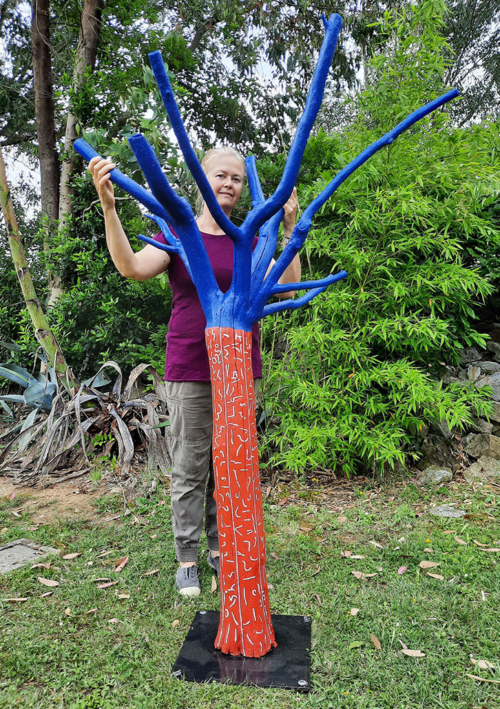 Albi. A dried apricot tree 180cm tall, worked, then coloured. Vanessa Thyes, 2025.
